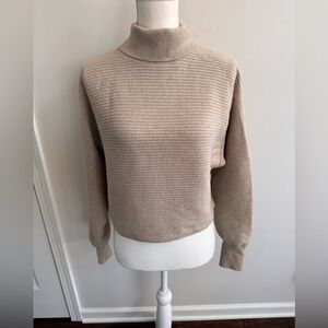 Good American Ribbed Turtle Neck Cropped Sweater in Tan